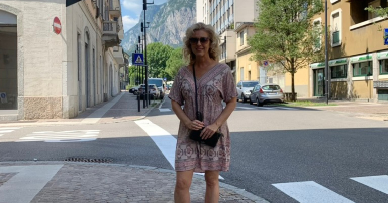 Mandy walking outside reflecting on life after the empty nest and finding herself again as a single mom