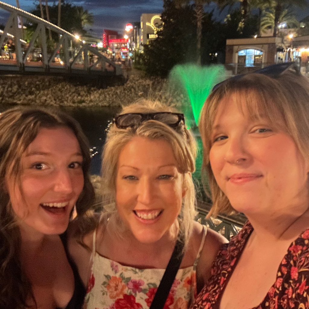 Mandy and her two daughters taking a selfie at Disney Springs