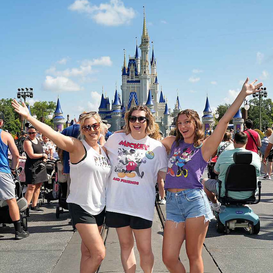 Mandy McMahan with her daughters at Magic Kingdom